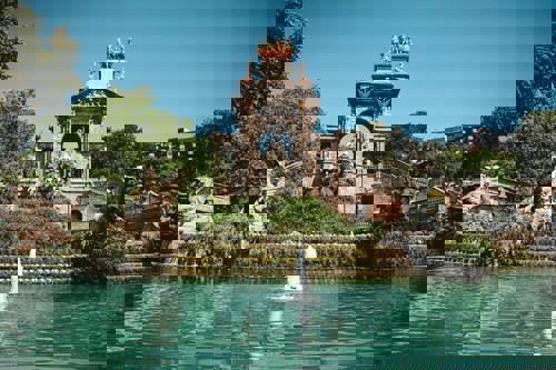 a large fountain in a park in barcelona