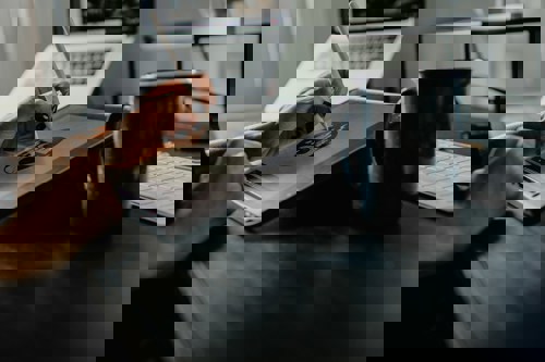 Someone drawing on an ipad with a stylus